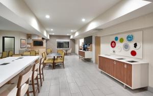 a lobby of a hospital with a table and chairs at Holiday Inn Express Heber City by IHG in Heber City