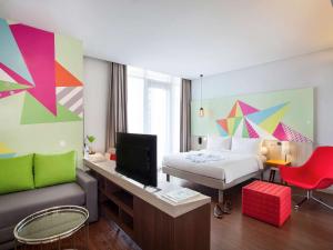 Voodi või voodid majutusasutuse Ibis Styles Jakarta Sunter toas