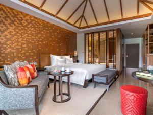 Postel nebo postele na pokoji v ubytování Pullman Luang Prabang