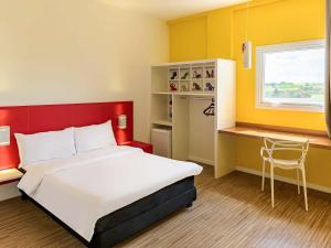 Postel nebo postele na pokoji v ubytování ibis Styles Birigui + 37 fotografií