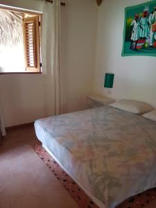 Postel nebo postele na pokoji v ubytování Casa Flamingo