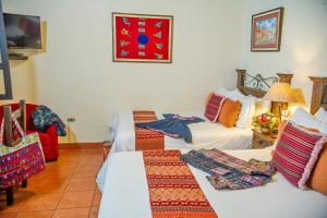 Krevet ili kreveti u jedinici u objektu Hotel Meson del Valle by AHS