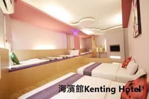 Voodi või voodid majutusasutuse Kenting Hostel toas