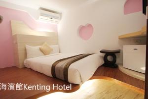 Voodi või voodid majutusasutuse Kenting Hostel toas