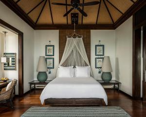 Ein Bett oder Betten in einem Zimmer der Unterkunft Four Seasons Resort Koh Samui