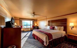 a hotel room with a bed and a television at Cape Fox Lodge in Ketchikan +47 photos