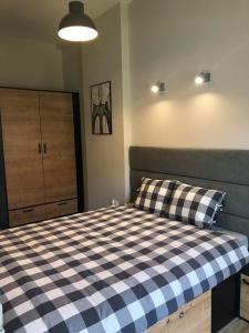 Uma cama ou camas num quarto em Property Apart - Soft Lofty Legnicka Centrum