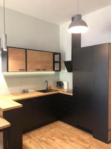 A cozinha ou kitchenette de Property Apart - Soft Lofty Legnicka Centrum