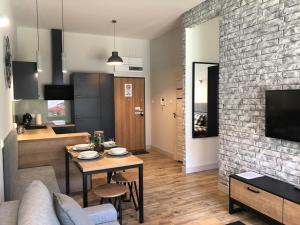 A cozinha ou kitchenette de Property Apart - Soft Lofty Legnicka Centrum