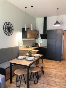 A cozinha ou kitchenette de Property Apart - Soft Lofty Legnicka Centrum