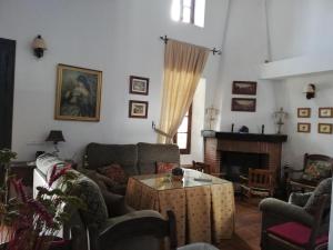 A seating area at Casa Rural La Maquinilla