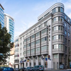 a large white building with a sign on it at Hotel Best Western City Centre in Brussels