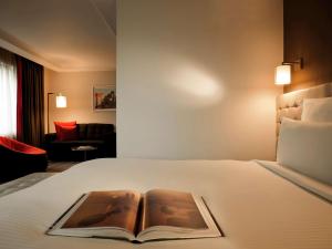 Postel nebo postele na pokoji v ubytování Pullman London St Pancras