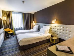 Postel nebo postele na pokoji v ubytování Pullman London St Pancras