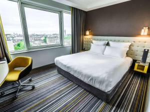 Postel nebo postele na pokoji v ubytování Pullman London St Pancras