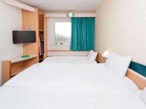Letto o letti in una camera di ibis Luxembourg Sud