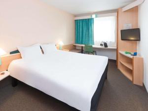 Letto o letti in una camera di ibis Luxembourg Sud