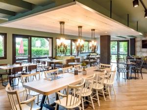 Ein Restaurant oder anderes Speiselokal in der Unterkunft ibis Creil Sur Oise 