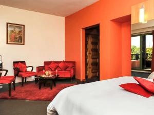 Postel nebo postele na pokoji v ubytování Ibis Marrakech Palmeraie
