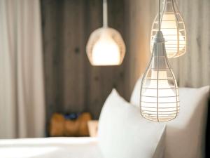 Letto o letti in una camera di Mercure Valence