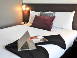 Postel nebo postele na pokoji v ubytování ibis Melbourne - Glen Waverley
