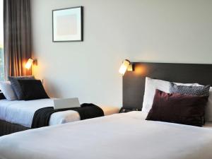 Postel nebo postele na pokoji v ubytování ibis Melbourne - Glen Waverley