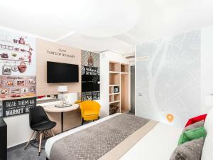 TV a/nebo společenská místnost v ubytování Mercure Budapest City Center + 37 fotografií
