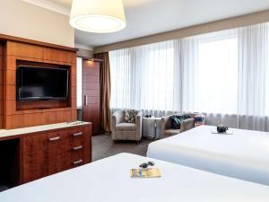 Ein Bett oder Betten in einem Zimmer der Unterkunft Mercure Bristol Holland House