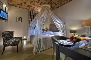 Postel nebo postele na pokoji v ubytování Best Western Hotel Piemontese