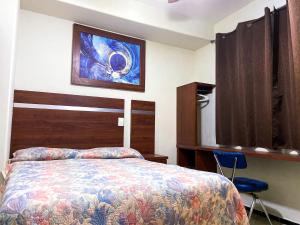 Un ou plusieurs lits dans un hébergement de l'établissement Hotel Diana