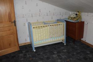 Postel nebo postele na pokoji v ubytování la maison de pierre