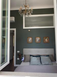 Voodi või voodid majutusasutuse Ortigia Twin Rooms toas