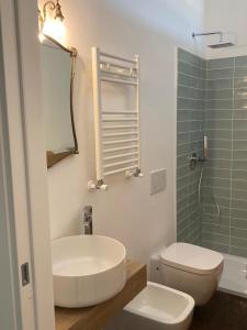Vannituba majutusasutuses Ortigia Twin Rooms