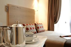 Postel nebo postele na pokoji v ubytování Best Western Hotel Piemontese