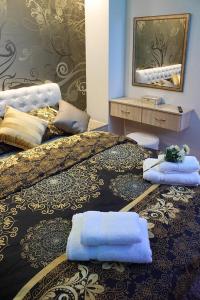 Katil atau katil-katil dalam bilik di Bane Apartmani