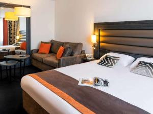 Postel nebo postele na pokoji v ubytování Mercure Lyon Centre - Gare Part Dieu