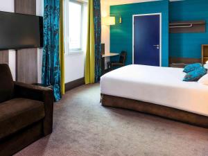 Postel nebo postele na pokoji v ubytování Ibis Styles Lyon Centre - Gare Part Dieu