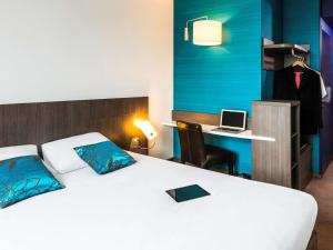 Postel nebo postele na pokoji v ubytování Ibis Styles Lyon Centre - Gare Part Dieu