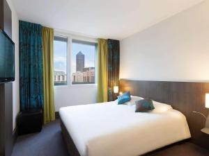 Postel nebo postele na pokoji v ubytování Ibis Styles Lyon Centre - Gare Part Dieu