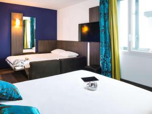 Postel nebo postele na pokoji v ubytování Ibis Styles Lyon Centre - Gare Part Dieu