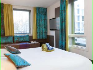 Postel nebo postele na pokoji v ubytování Ibis Styles Lyon Centre - Gare Part Dieu