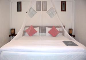 Ένα ή περισσότερα κρεβάτια σε δωμάτιο στο The Hangout@ EcoTravel +50 φωτογραφίες