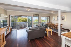 a living room with a couch and a table at Bay Vista in Quindalup