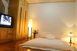 Cama o camas de una habitación en Yilan Affectivity