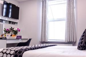 Katil atau katil-katil dalam bilik di Bella Vista Hotel & Self Catering Suites