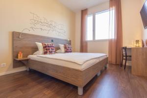 Katil atau katil-katil dalam bilik di B&B Hotel Peter und Paul