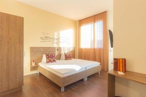 Katil atau katil-katil dalam bilik di B&B Hotel Peter und Paul
