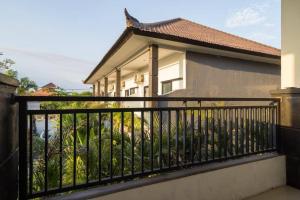 Μπαλκόνι ή βεράντα στο Kubu Lestari Homestay