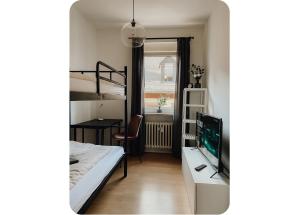Poschodová posteľ alebo postele v izbe v ubytovaní Attraktive 3-Zimmerwohnung - Zentrum Würzburg & nähe Bahnhof