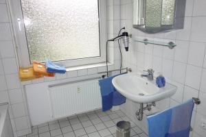Kylpyhuone majoituspaikassa Ferienwohnungen Viersen